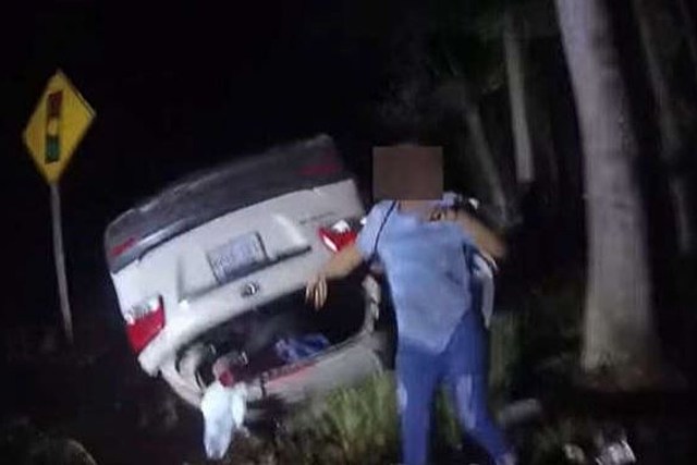 Cop Single-Handedly Lifts Car Off Woman To Save Her Life